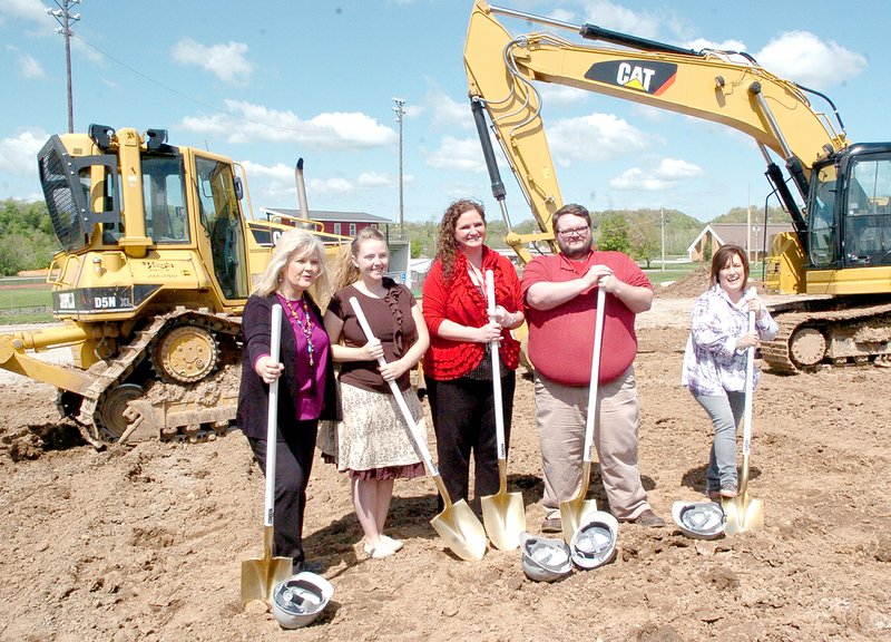 RICK PECK MCDONALD COUNTY PRESS Helping out with Monday&#8217;s groundbreaking for a new FEMA safe room/performing arts center were McDonald County High School performing arts teachers. From left to right: Charlene Bergen, art; Emily Wooten, drama; Laurie Kinder-Lang, band; Tyler Davis, debate; and Stacie Campbell, chorus.