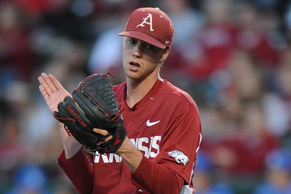 Trey Killian of Arkansas celebrates the final out of the fourth inning against Kentucky Friday, April 10, 2015, at Baum Stadium in Fayetteville.