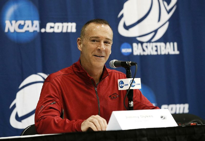 Arkansas head coach Jimmy Dykes responds to a question during a news conference for the second round of the NCAA women's college basketball tournament, Saturday, March 21, 2015, in Waco, Texas. Arkansas plays Baylor on Sunday. (AP Photo/Tony Gutierrez)