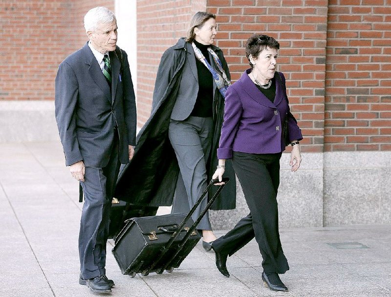 Members of the legal defense team for Boston Marathon bomber Dzhokhar Tsarnaev, from the left, David Bruck, Judy Clarke, and Miriam Conrad, arrive at federal court, Thursday, April 23, 2015, during the penalty phase of the trial for Tsarnaev, in Boston. (AP Photo/Steven Senne)