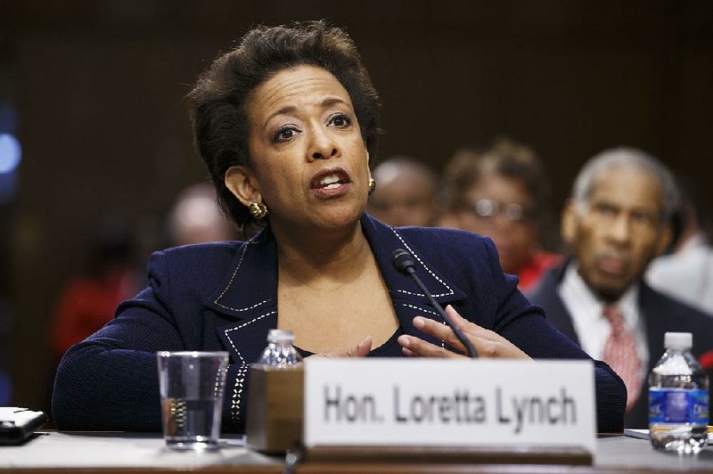 FILE - In this Jan. 28, 2015 file photo, Attorney General nominee Loretta Lynch testifies on Capitol Hill in Washington. Lynch has won confirmation to serve as the nation's attorney general, ending months of delay. The vote was 56-43 in the Senate Thursday.   (AP Photo/J. Scott Applewhite)