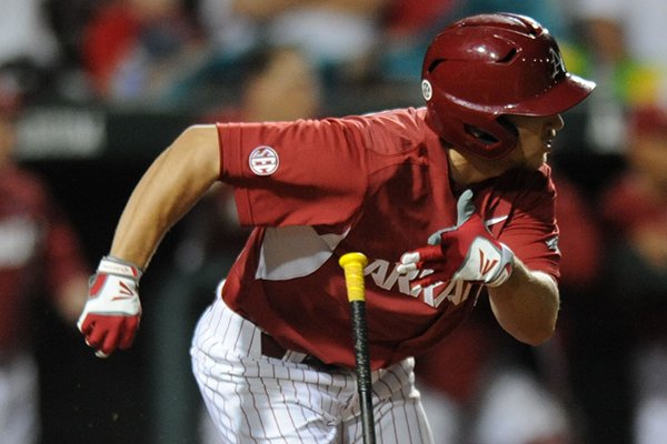 Joe Serrano of Arkansas heads to first after an RBI single to take the lead against Mississippi State during the eighth inning Friday, April 24, 2015, at Baum Stadium.