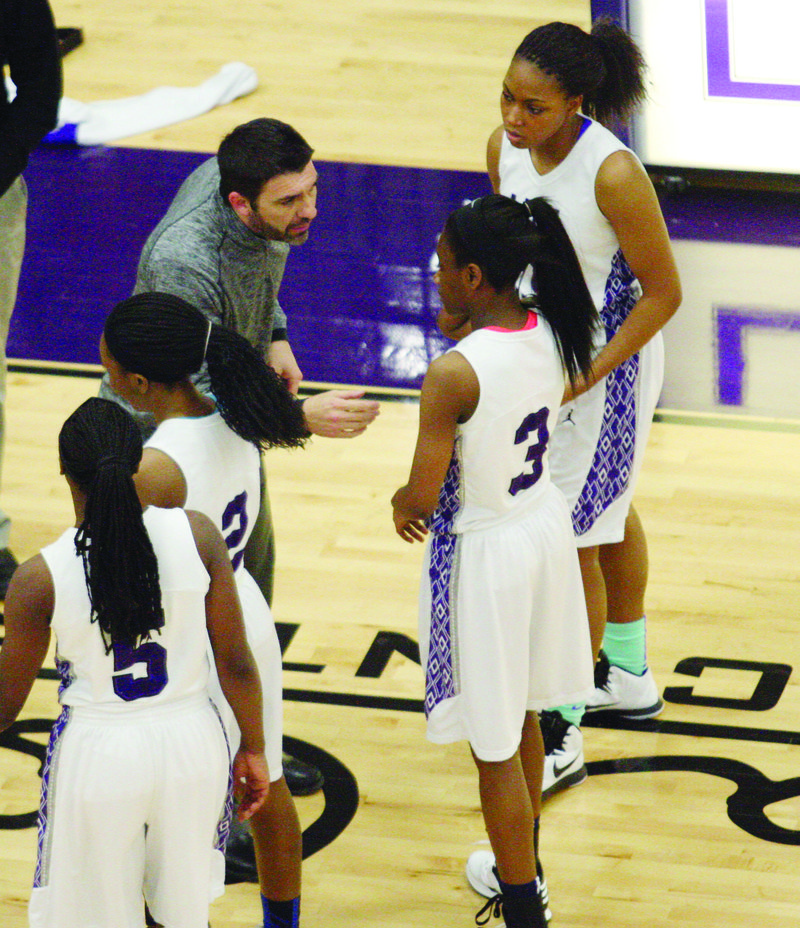 Riverview Lady Raiders coach Ryan Smith talks to his team during the 4A-2 district tournament. Smith is the 2015 Three Rivers Edition Basketball Coach of the Year.