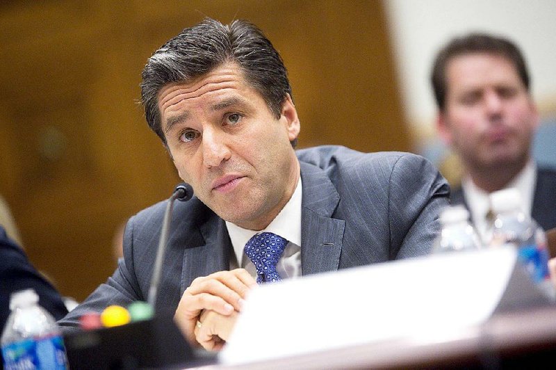 Robert Marcus, chairman and chief executive officer of Time Warner Cable Inc., speaks during a House Judiciary Subcommittee hearing in Washington, D.C., U.S., on Thursday, May 8, 2014. The Justice Department and Federal Communications Commission (FCC) are considering Comcast Corp.'s $45.2 billion proposal in February to acquire Time Warner Cable Inc. The deal would combine the two largest U.S. cable companies and give the enlarged Comcast about 30 million subscribers. Photographer: Andrew Harrer/Bloomberg *** Local Caption *** Robert Marcus