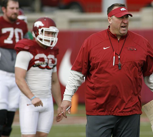 NWA Democrat-Gazette/David Gottschalk RED SET: Arkansas football coach Bret Bielema begins practice Tuesday in Fayetteville. Bielema, off a 7-6 season that saw late wins over LSU, Ole Miss and Texas, ends his third spring on campus with the Razorbacks' annual Red-White game at 1 p.m. today at Reynolds Razorback Stadium.