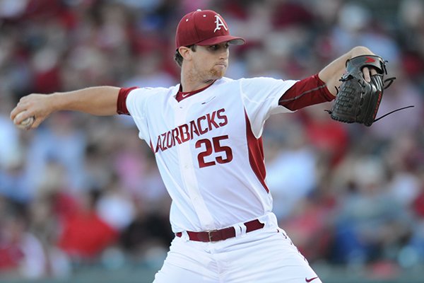 Dominic Taccolini of Arkansas delivers to the plate against Mississippi State during the fourth inning Saturday, April 25, 2015, at Baum Stadium in Fayetteville.