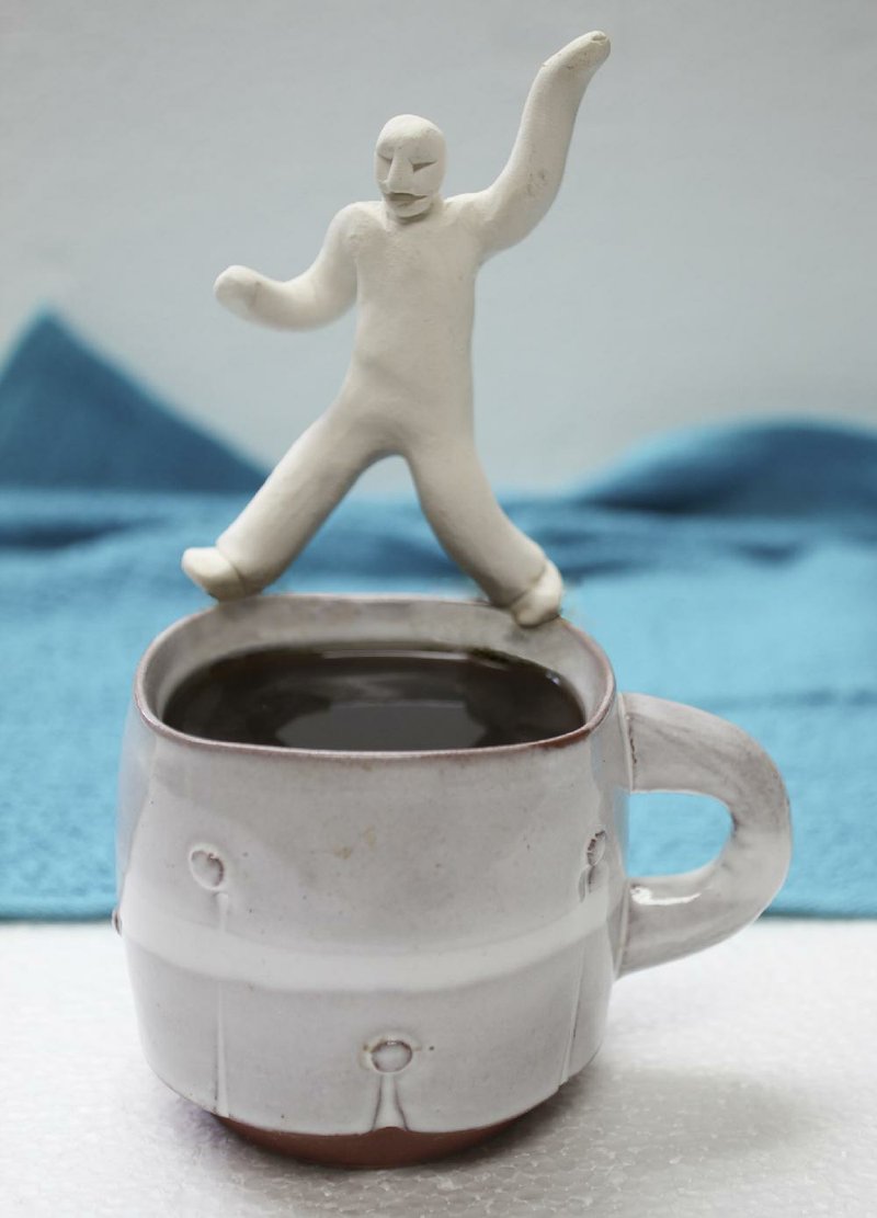 Democrat-Gazette illustration/CELIA STOREY
Little man over a cup of coffee for ActiveStyle secondary illustration, April 27, 2015. Cup is by Little Rock artist Ashley Morrison.