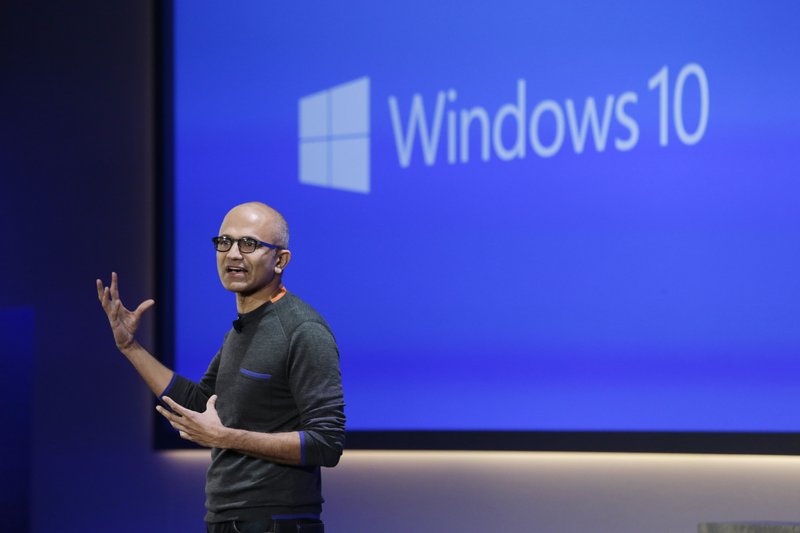 AP/ELAINE THOMPSON CEO Satya Nadella speaks at an event in January demonstrating new features of Microsoft&#8217;s flagship operating system, Windows, at the company&#8217;s headquarters in Redmond, Wash. 