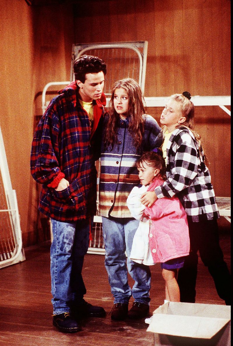 ABC12(8/24/93) - FULL HOUSE-- Michelle (Mary-Kate Olsen, front), Stephanie (Jodie Sweetin, right), D.J. (Candace Cameron, center), and Steve (Scott Weinger, left) all try to act brave despite ghostly apparitions that appear out of the mist at their summer camp site in "It Was A Dark and Stormy Night," the season premiere of "Full House" airing TUESDAY, SEPTEMBER 14 (8:00-8:30 p.m., ET) on the ABC Television Network.