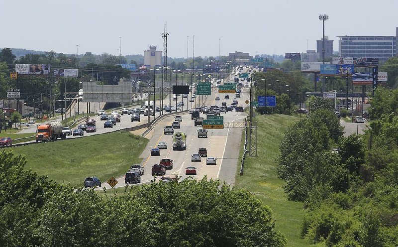 Arkansas Democrat-Gazette/RICK MCFARLAND --04/27/15--    Traffic travels on the I-30 corridor between I-40 in North Little Rock toward Little Rock Monday.