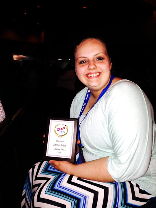 Submitted Photo Samantha Goble shows an award she earned during the FBLA Leadership Conference in Little Rock April 16. Submitted Photo Senior Samantha Goble poses with award she earned at the Future Business Leaders of America state competition held in Little Rock April 16. Goble will compete in the national competition in Chicago June 27 and is the first student from Decatur to qualify for this contest.