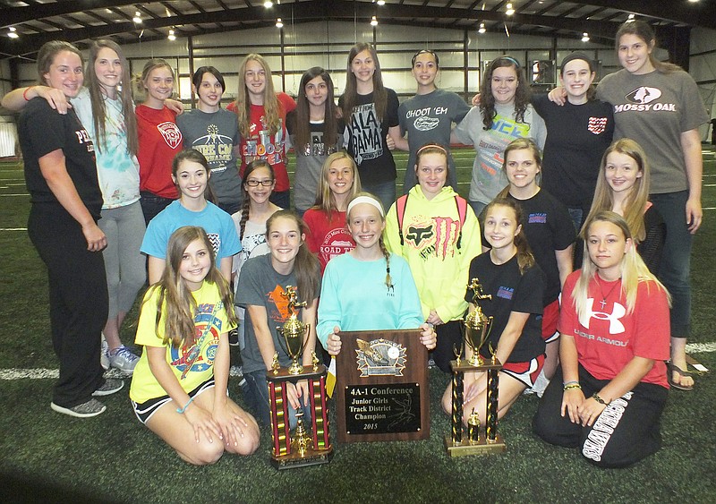 TIMES photograph by Annette Beard Junior Lady Blackhawks won the District track meet Thursday, April 23. Their coach is Anya Bruhin.