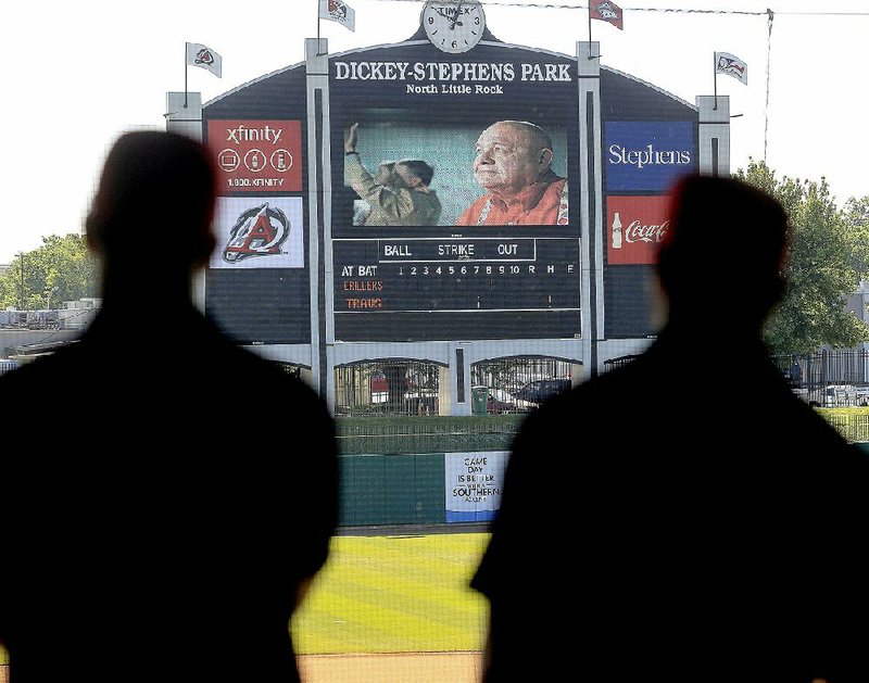 A montage of photographs from Bill Valentine’s career with the Arkansas Travelers was shown on the video board during a public memorial service Thursday at Dickey-Stephens Park in North Little Rock.