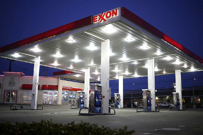 The pumps were idle at an Exxon Mobil Corp. gas station in Richmond, Ky., on Wednesday. The oil company on Thursday reported a first-quarter profit of $4.94 billion. 