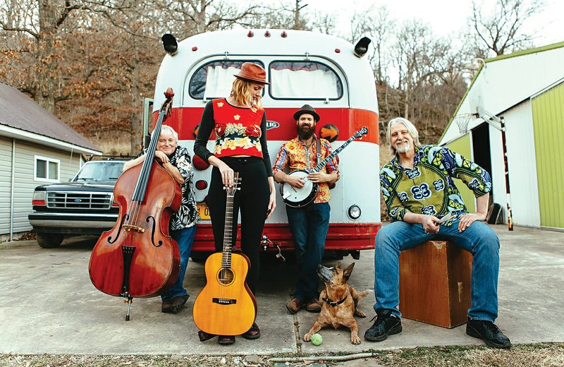 Dana Idlet (center) is the frontwoman for Dana Louise and the Glorious Birds, a new band that also includes Keith Grimwood (from left), Adams Collins and Ezra Idlet, Dana’s dad. The group will celebrate the release of its first CD Tuesday at George’s.