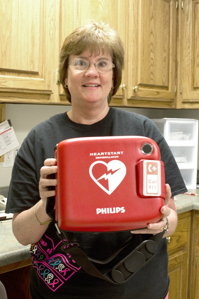 Yolanda Reed, an advanced-practice registered nurse at Pleasant Plains Medical Clinic, said she is happy the clinic now has an AED (automated external defibrillator) as a result of grants obtained by the White River Health System Foundation.