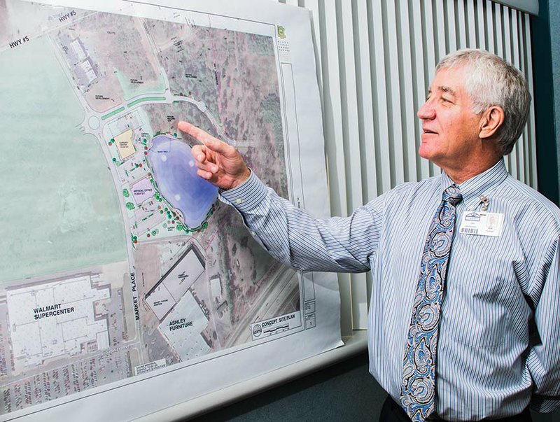 Saline Memorial Hospital CEO Bob Trautman points out the location of the new Saline County Memorial Bryant Medical Campus. Located at the intersection of Market Place Drive and Arkansas 5, the campus will include a medical office building that will house two existing clinics, plus an outpatient surgery center.