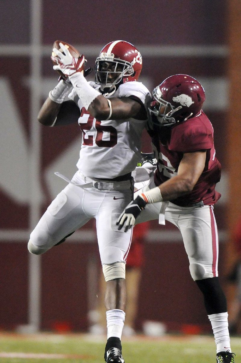 Former Alabama safety Landon Collins (left) was chosen by the New York Giants with the fi rst pick in the second round of the NFL Draft on Friday. Dallas, the Giants’ NFC East rival, took former Nebraska defensive end Randy Gregory with its initial pick in the round.