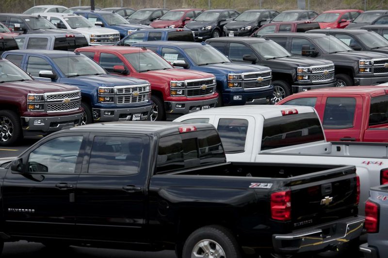 General Motors Co. pickups fill a lot this week at Phillips Chevrolet in Frankfort, Ill. Pickups were big sellers in April. 