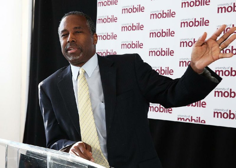 Potential Republican 2016 presidential candidate Ben Carson speaks to the media at the Arthur Outlaw Mobile Convention Center in Mobile, Ala., before he was to deliver a speech at a fundraising dinner for the University of Mobile, Thursday, April 30, 2015, in Mobile, Ala. Carson is a retired neurosurgeon turned conservative star. (Mike Brantley/AL.com via AP)  MAGS OUT; MANDATORY CREDIT