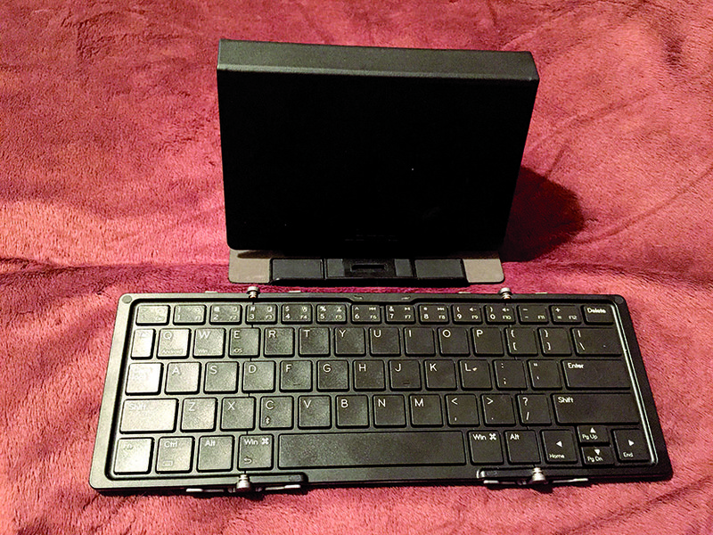 The Jorno Tri-Fold Bluetooth Keyboard includes a carrying case
that, when folded, doubles as a stand for the smartphone or tablet
being used with the keyboard.