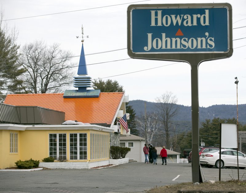 Customers walk into Howard Johnson’s Restaurant in Lake George, N.Y., in early April. The HoJos
on the main strip of the Adirondack Mountain resort town of Lake George and another in Bangor,
Maine, are the last two restaurants operating under the famous name.