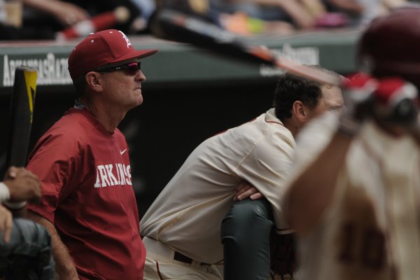 Arkansas coach Dave Van Horn watches from the dugout as the Razorbacks play Kentucky on Sunday, April 12, 2015, at Baum Stadium.