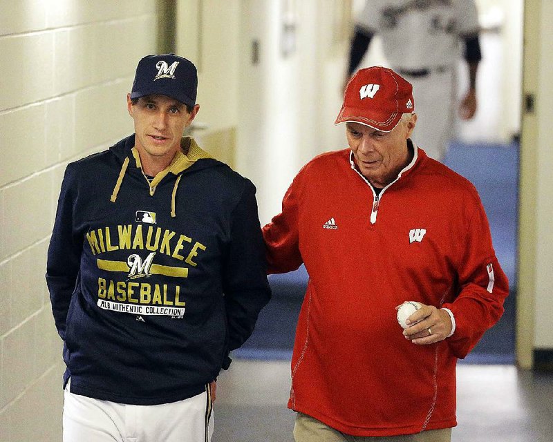 Milwaukee Brewers manager Craig Counsell talks to Wisconsin basketball coach Bo Ryan before a baseball game against the Los Angeles Dodgers Monday, May 4, 2015, in Milwaukee. (AP Photo/Morry Gash)