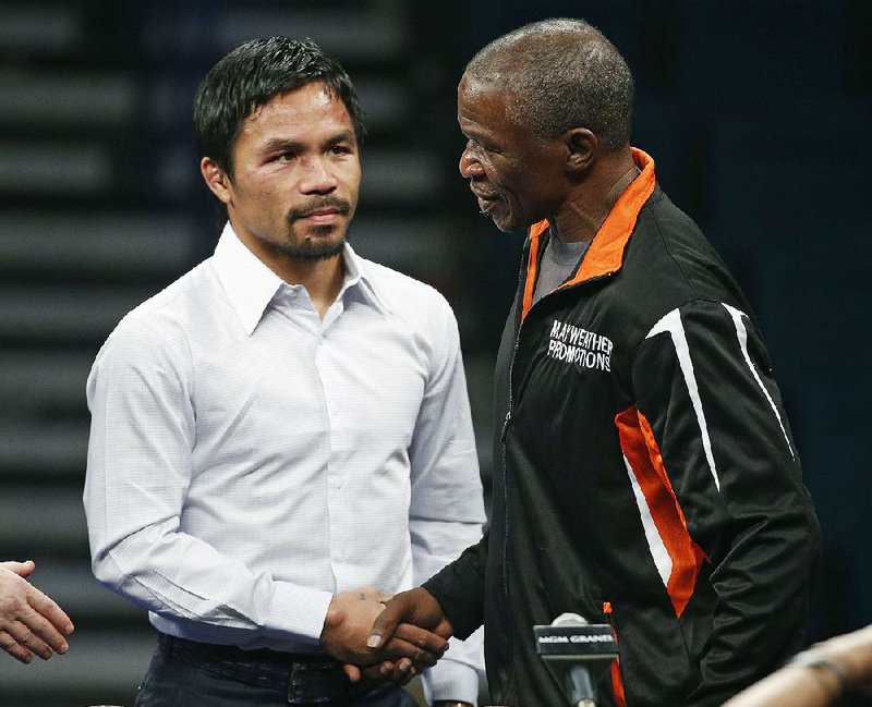 Manny Pacquiao, left.