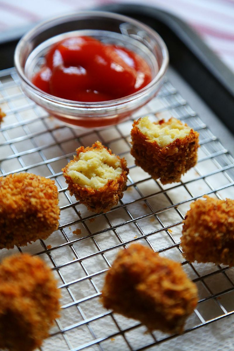 Golden brown and crispy Homemade Tater Tots are excellent sprinkled with salt and dipped in ketchup. 