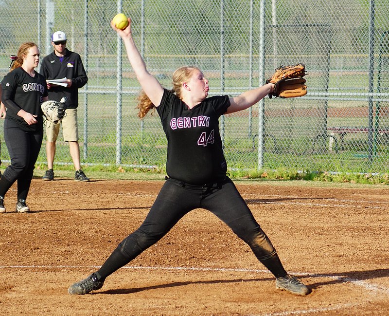 File Photo by Randy Moll Alyssa Kelton prepares to throw a pitch for Gentry in an earlier home game this season. Baeley Metz is playing first base.