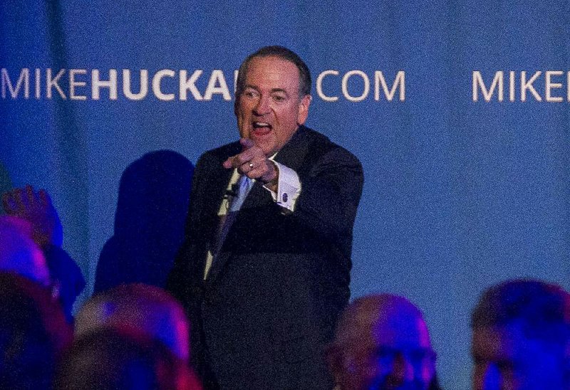 Mike Huckabee greets the crowd gathered Tuesday for his presidential campaign kickoff at a packed hall at the University of Arkansas Community College at Hope. 