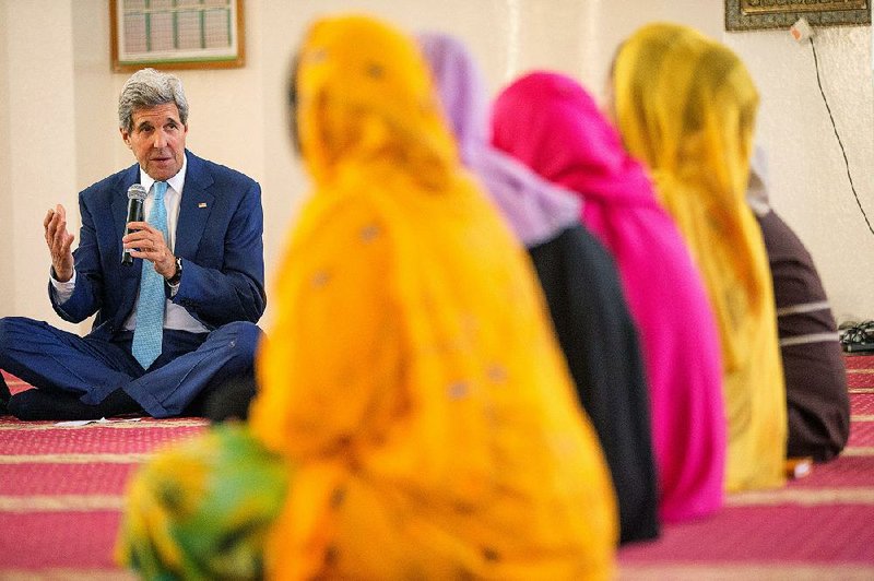 Secretary of State John Kerry meets with youths Wednesday during a visit to Salman Mosque in Djibouti, Djibouti. 