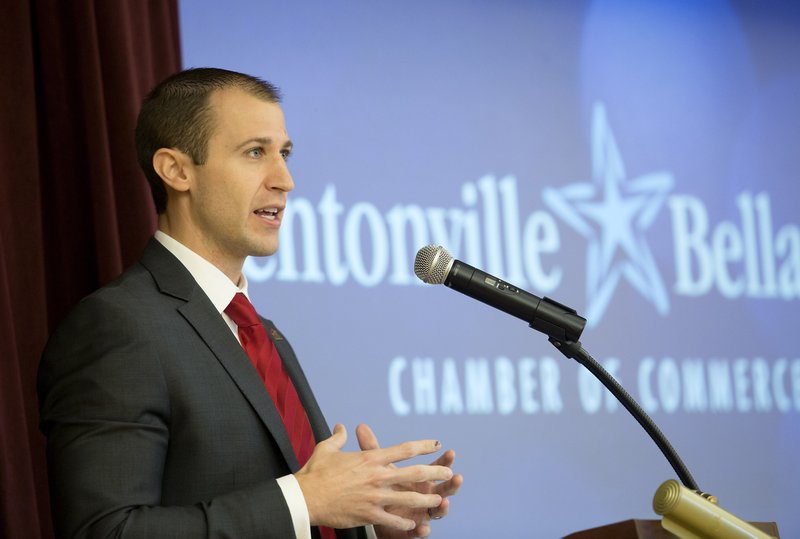 NWA Democrat-Gazette/JASON IVESTER Mike Preston, executive vice president of Arkansas Economic Development Commission, speaks Wednesday during the Bentonville/Bella Vista Chamber of Commerce&#8217;s first Small Business Awards Luncheon at the Bentonville Community Center. For photo galleries, go to nwadg.com/photos.