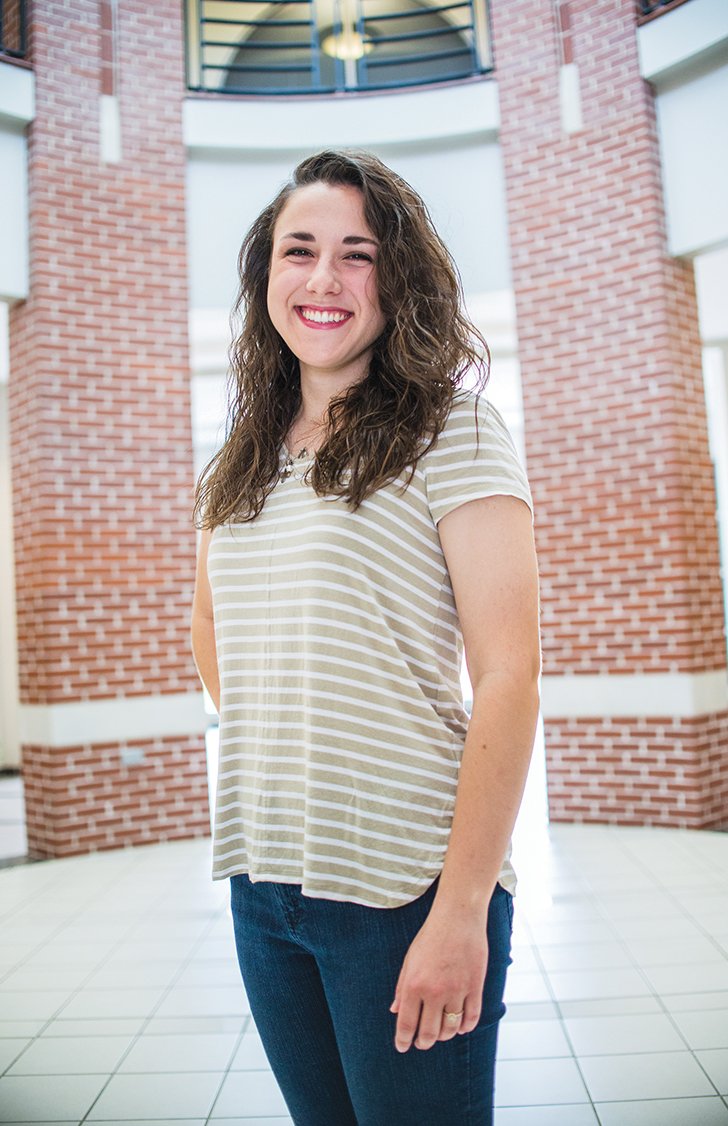 Emily Blackard stands inside the student center at Arkansas Tech University in Russellville, her hometown. Blackard was home-schooled until she was in the eighth grade, which she said was an advantage when she got into public school. Her former adviser at Arkansas Tech called her “brilliant” and nominated her for the top outstanding female senior award, which she won.