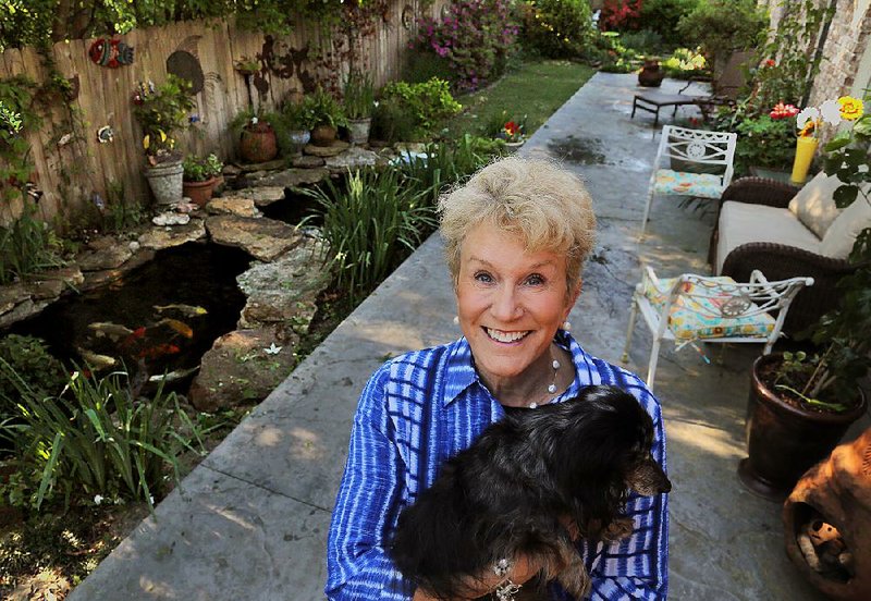 Arkansas Democrat-Gazette/JOHN SYKES JR. - Personal Space - Beth Mason is a business coach and motivational speaker. Her favorite place is her patio, which has a koi pond.
