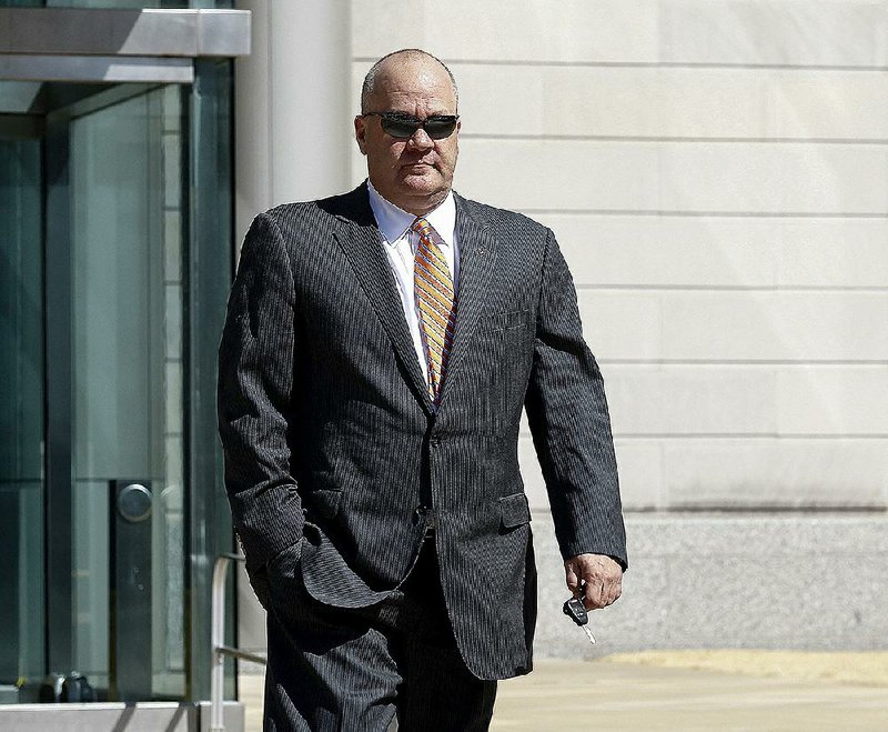 Arkansas Democrat-Gazette/STATON BREIDENTHAL --3/10/14-- Former bond broker Steele Stephens leaves the federal courthouse in Little Rock Monday after testifying in  former Arkansas Treasurer Martha Shoffner's trial. 