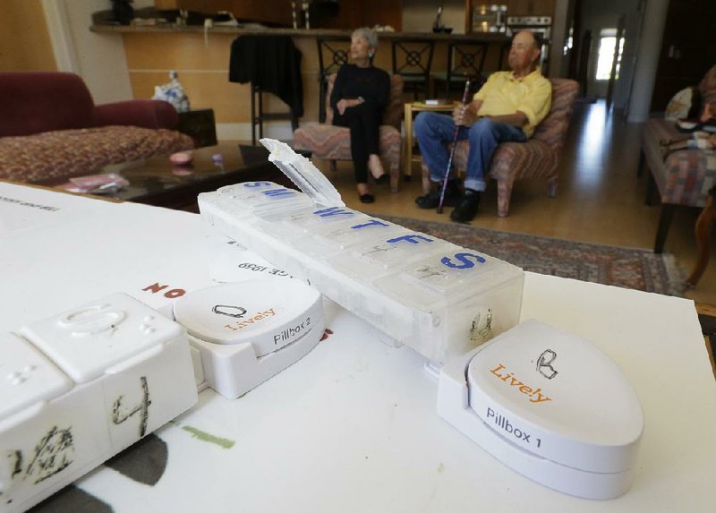 Sensors are attached to pill containers at the home of Dorothy, 80, and Bill Dworsky, 81, in San Francisco. 