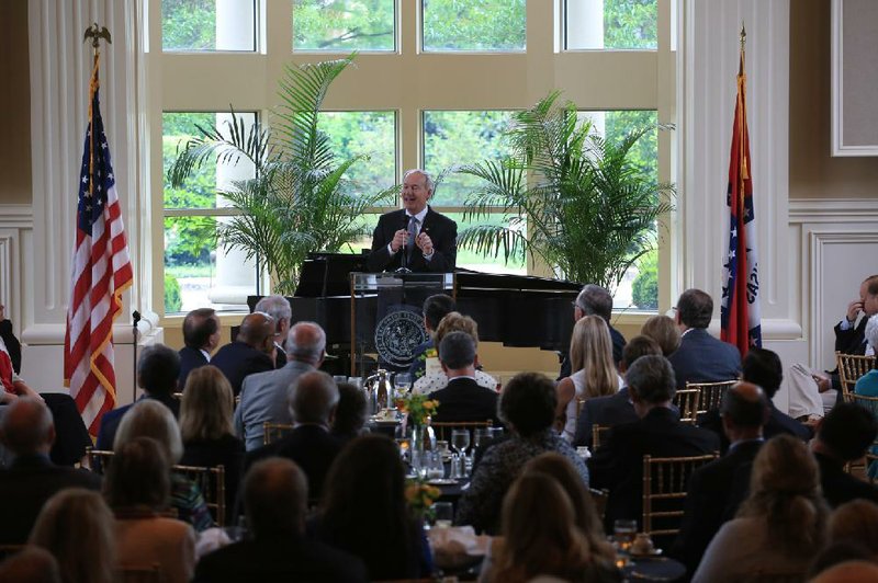FILE PHOTO:   Gov. Asa Hutchinson speaks during a luncheon for the Political Animals Club at the Governor's Mansion in Little Rock in 2015.