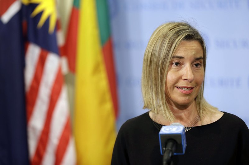 Federica Mogherini, the high representative of the European Union for foreign affairs, speaks to reporters after a security council meeting at United Nations headquarters, Monday, May 11, 2015. The European Union's top diplomat has assured the U.N. Security Council that under a proposed EU maritime operation against the growing wave of migrant smuggling, "no refugee or migrant intercepted at sea will be sent back against their will."