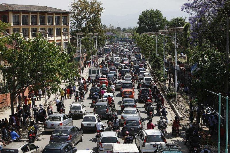 Traffic grinds to a halt Tuesday in Kathmandu after a second strong earthquake struck Nepal. 