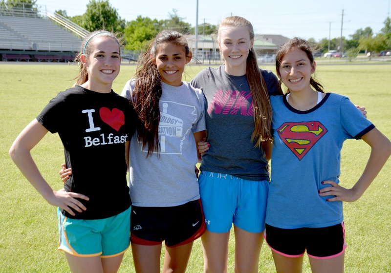 Graham Thomas/Herald-Leader The Siloam Springs 4x800-meter relay team of, from left, freshman Caroline Farine, junior Alexis Duffy, sophomore Hannah Herring and sophomore Jasmine Guillen finished second in the Class 6A state meet and qualified for the Meet of Champions, which will be held Saturday in Russellville. Guillen won the 3,200-meter run at the state meet and automatically qualified in that event, while Duffy&#8217;s mark of 5-2 in the high jump at the state meet was also good enough to qualify.