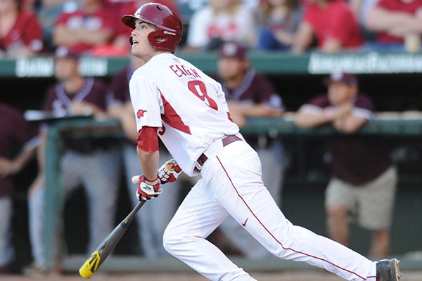 Clark Eagan of Arkansas connects with a hit against Mississippi State on Saturday, April 25, 2015, at Baum Stadium in Fayetteville. 