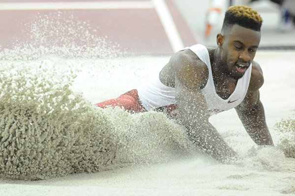 Jarrion Lawson of Arkansas competes in the long jump during the Tyson Invitational Friday, Feb. 13, 2015, at the Randal Tyson Track Center in Fayetteville.