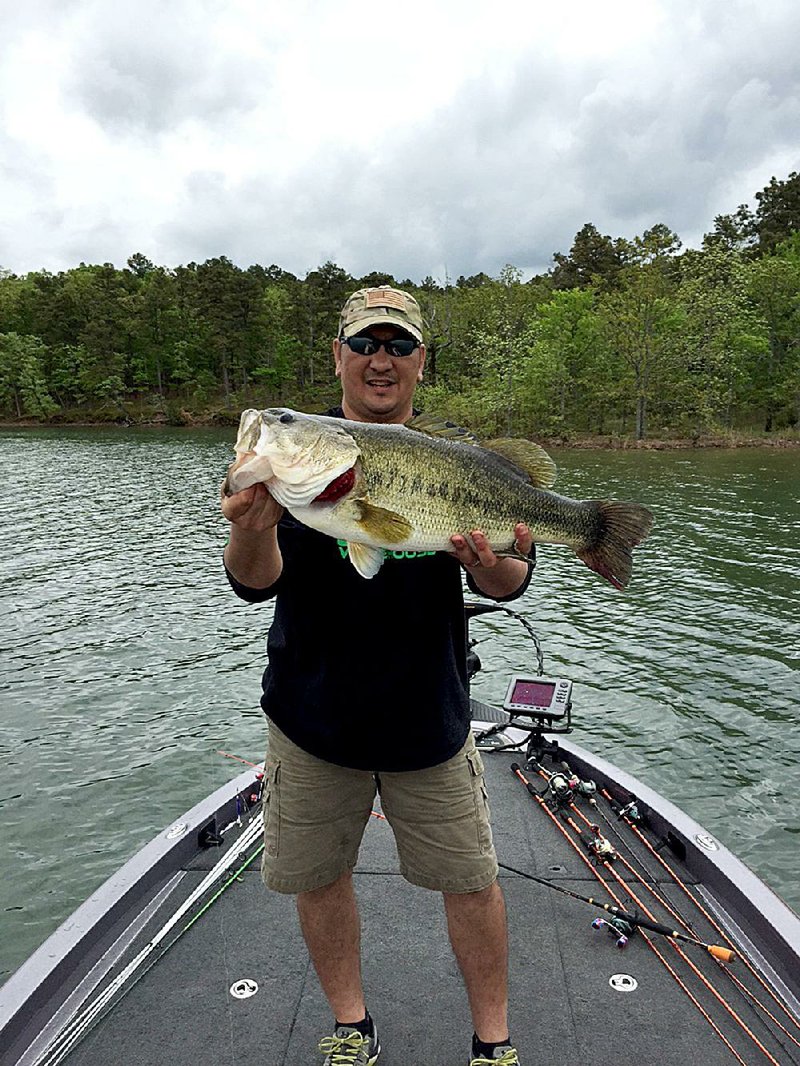 Doug McGoarty recently caught this 11-pound, 11-ounce largemouth bass on Lake Maumelle with a 10-inch worm. He said the fish had already spawned or it would have weighed more.