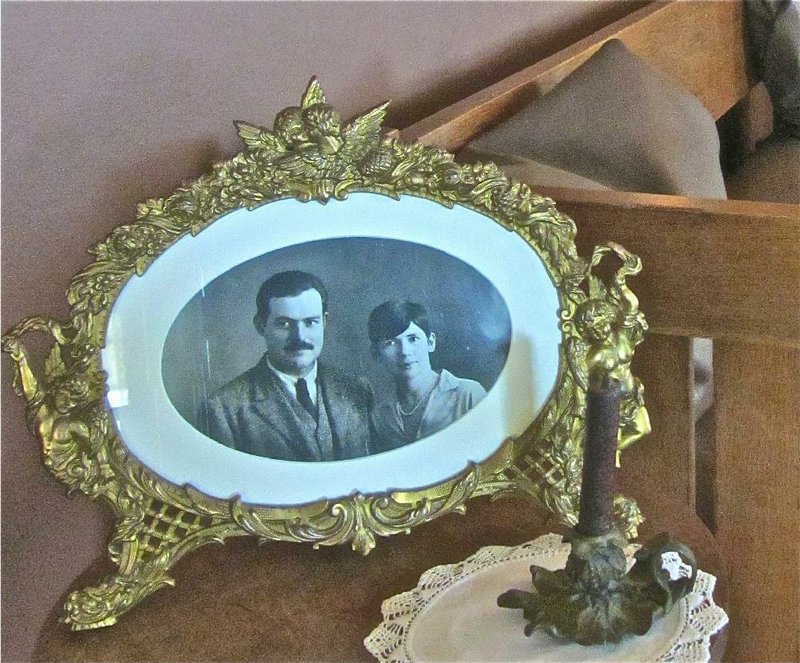 A photograph of Ernest and Pauline greets visitors to the Hemingway-Pfeiffer Museum and Educational Center in Piggott. 