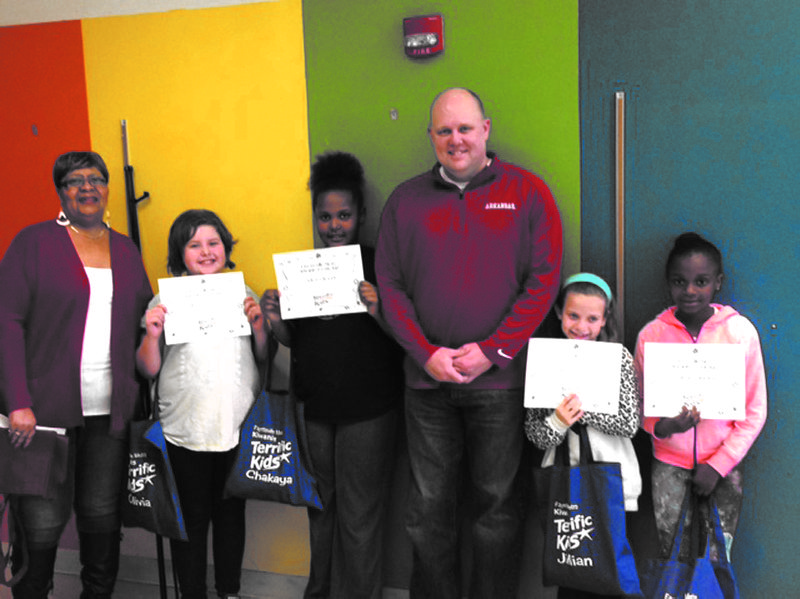 Courtesy Photo The Fayetteville Boys &amp; Girls Club Terrific Kids were named in a recent ceremony. They are Olivia Fredrick (from left), Chakaya Woods, Jillian Russell and Jermilyah Calamese. Also pictured are Fayetteville Metro Kiwanis Board members, Glenda Deffebaugh and Jay Cote. February winners were Jillian Russell and Chakaya Woods. March winners were Olivia Frederick and Jermilyah Calamese.