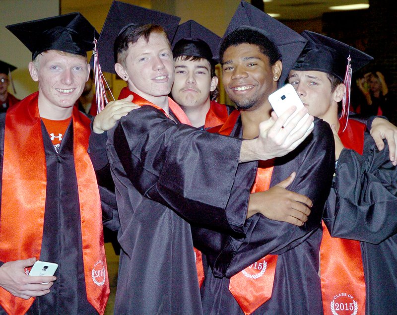 Cody Whillock, Dyllan Fitts, Dalton Woods, Lavonte Jackson and Keaton Weber (left to right) take a group &#8220;selfie&#8221; Saturday night prior to graduation ceremonies at McDonald County High School.