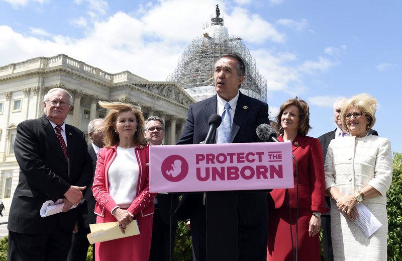Rep. Trent Franks, R-Ariz., center, speaks during a news conference on the Pain-Capable Unborn Child Protection Act  on Capitol Hill in Washington, Wednesday, May 13, 2015. Franks is joined by, from left, Rep. Joseph Pitts, R-Pa., Rep. Marcia Blackburn, R-Tenn., Rep. Chris Smith, R-N.J., Rep. Vicky Hartzler, R-Tenn., Rep. Mike Kelly, R-Pa., and Rep. Diane Black, R-Tenn.