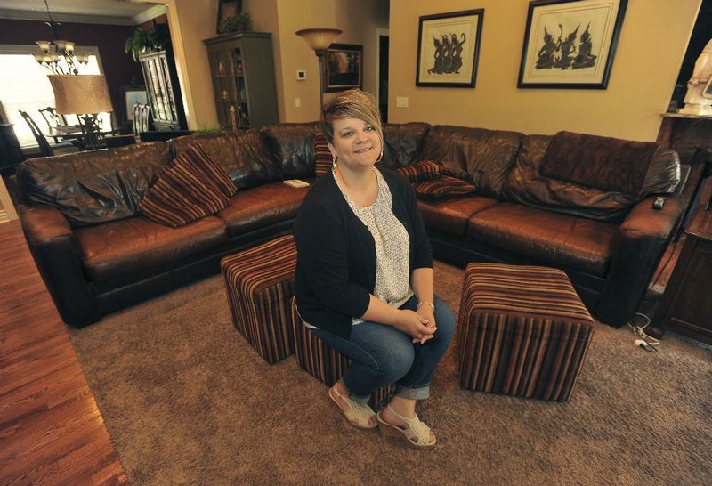 Mary Lou Gates in her living room at her Fayetteville home.